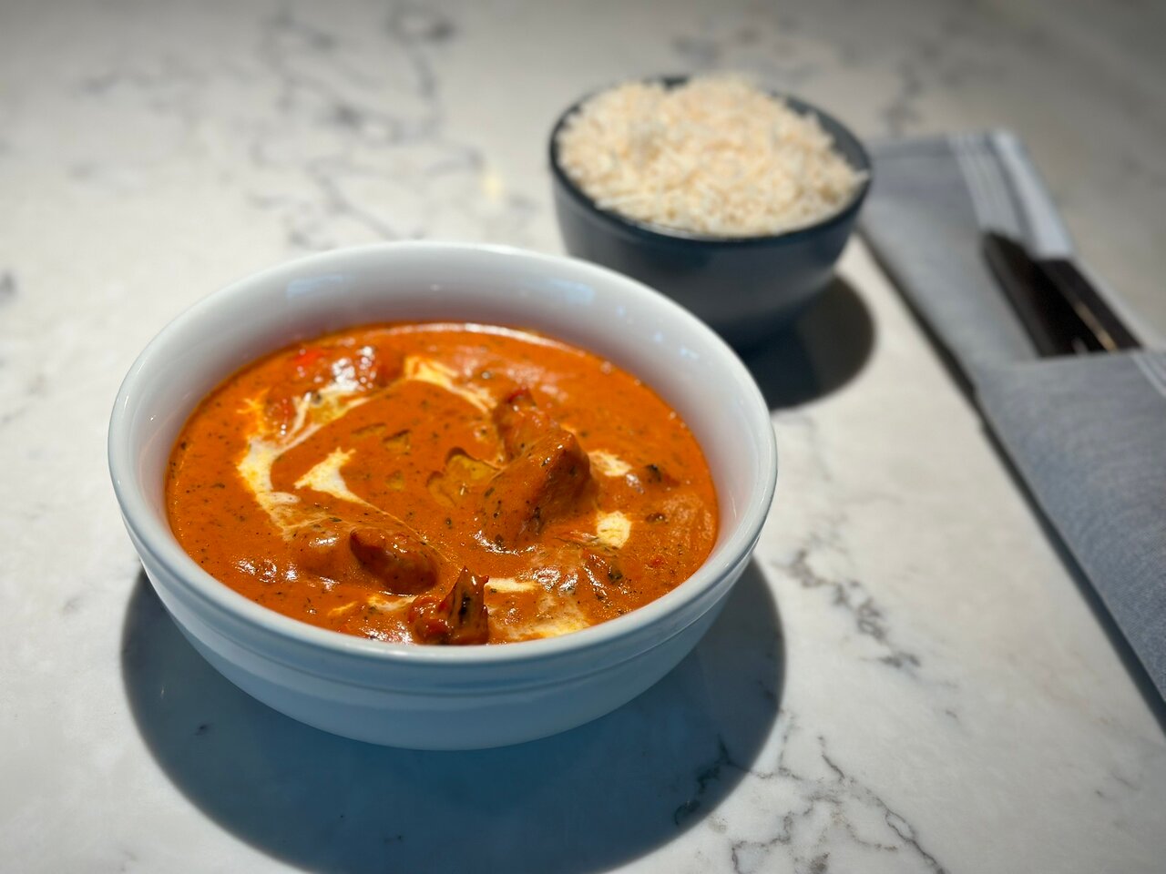 Kinaara signature dishes Butter Chicken, Lamb Shank, Paneer Pinwheel, Deconstructed Samosa Chaat